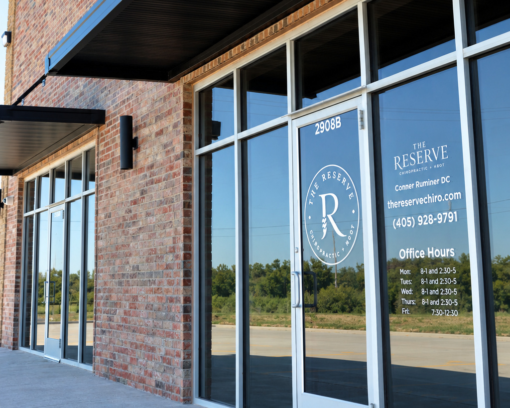 The Reserve Chiropractic storefront with logo on the door